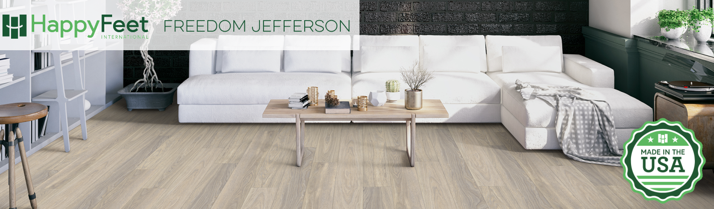 Happy Feet Freedom Jefferson Luxury Vinyl Plank floor installed in the living room with a white couch.