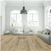 Happy Feet Stone Elegance II Mineral Oak Luxury Vinyl Plank Flooring installed in a room