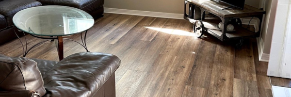 Spring Tech Enhanced Brown Luxury Vinyl Plank Flooring installed in a living room in Tampa, Florida